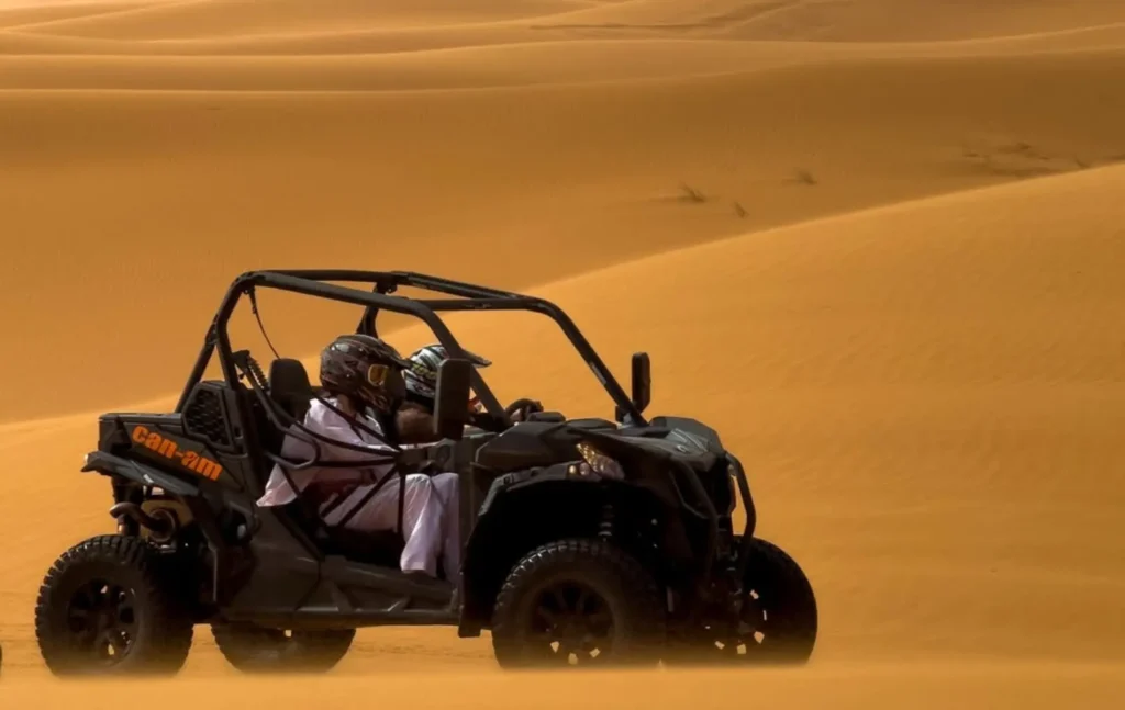 A desert buggy Merzouga adventure across the golden dunes of Merzouga desert tours.