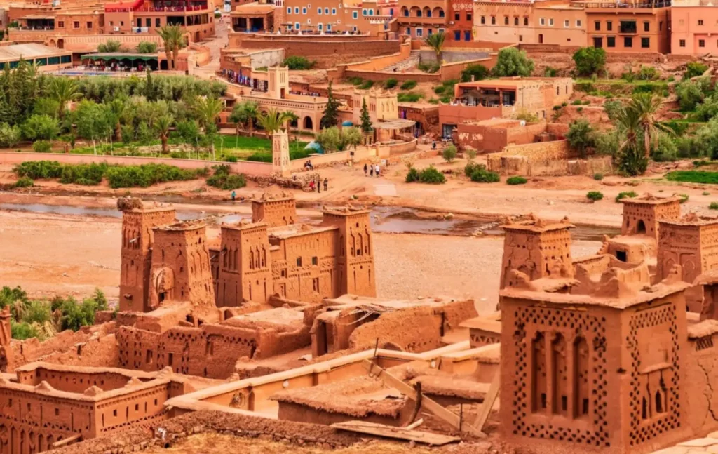 A wide view of the historic mud-brick buildings and towers at Ait Ben Haddou during a 2 days desert tour from marrakech to zagora.