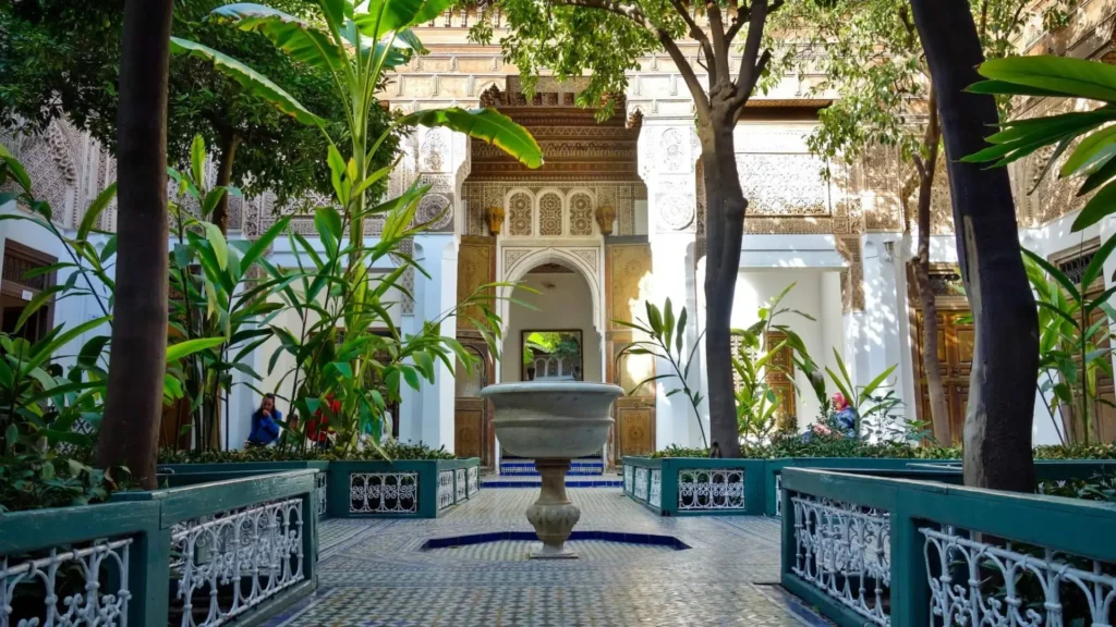 Things to do in Marrakech touring the intricate carved stucco and courtyard gardens of Bahia Palace