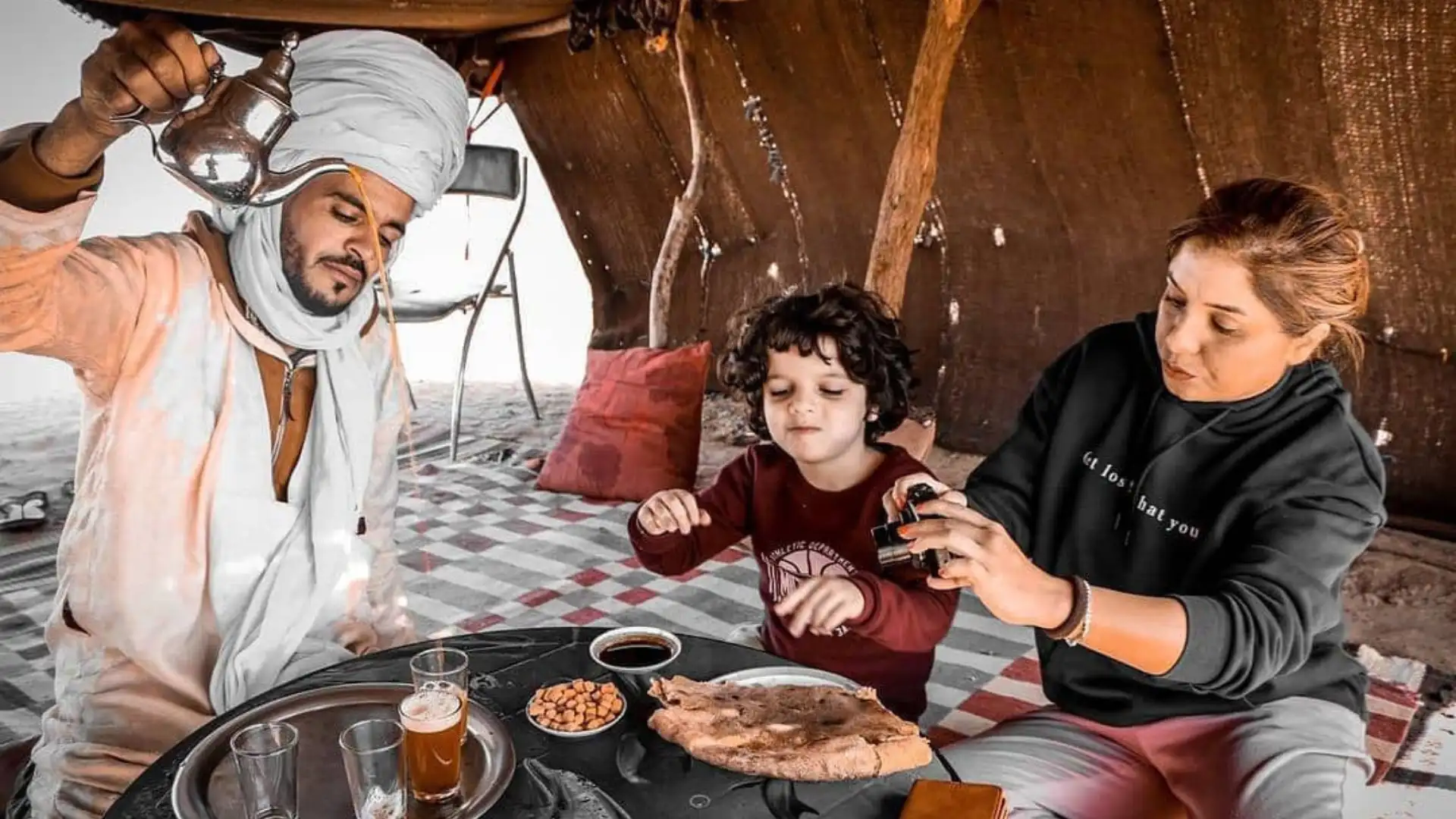 Mint tea with a nomad family in a desert tent